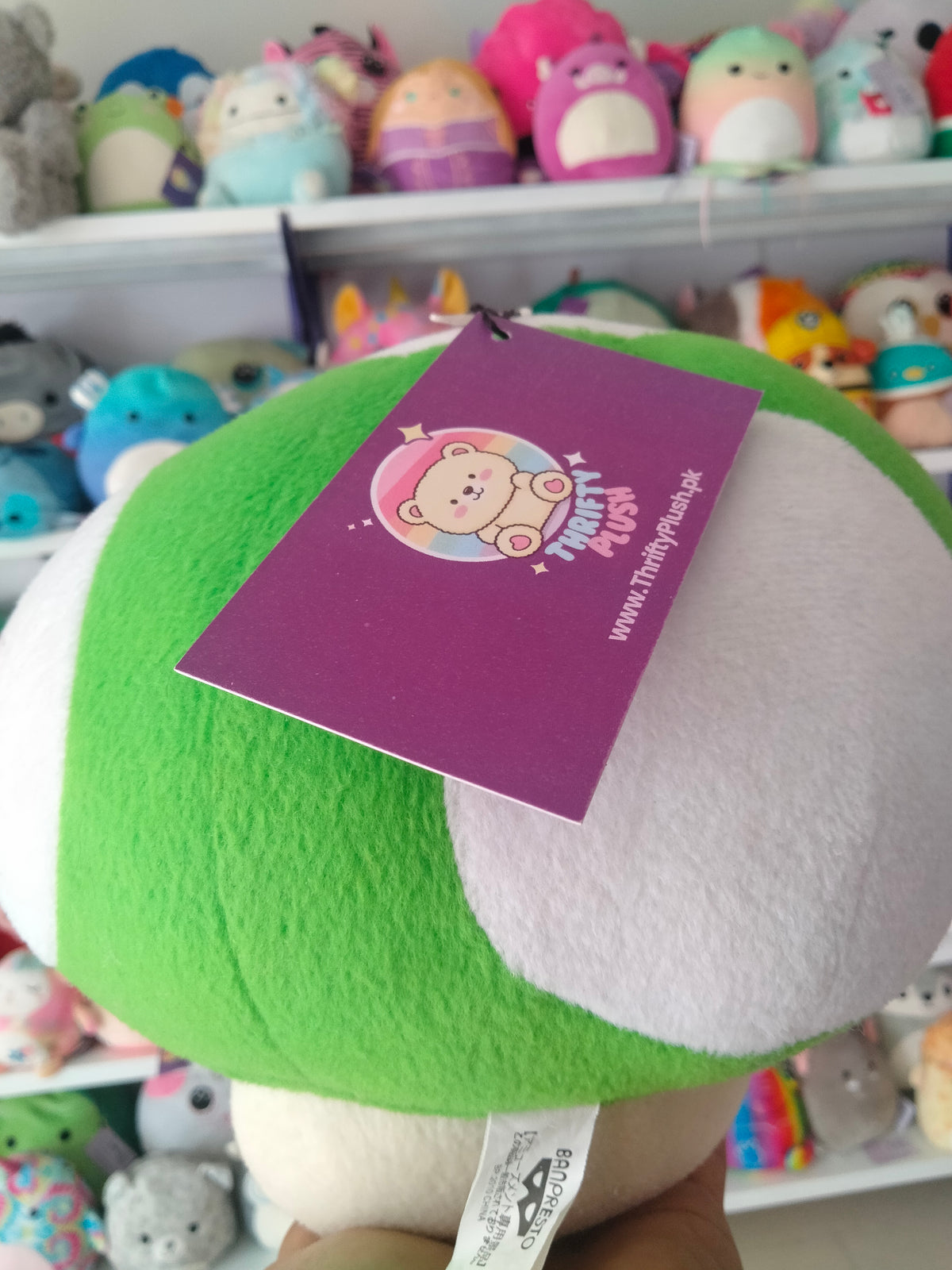 Super Mario All Star Collection 1-Up Mushroom plush doll.