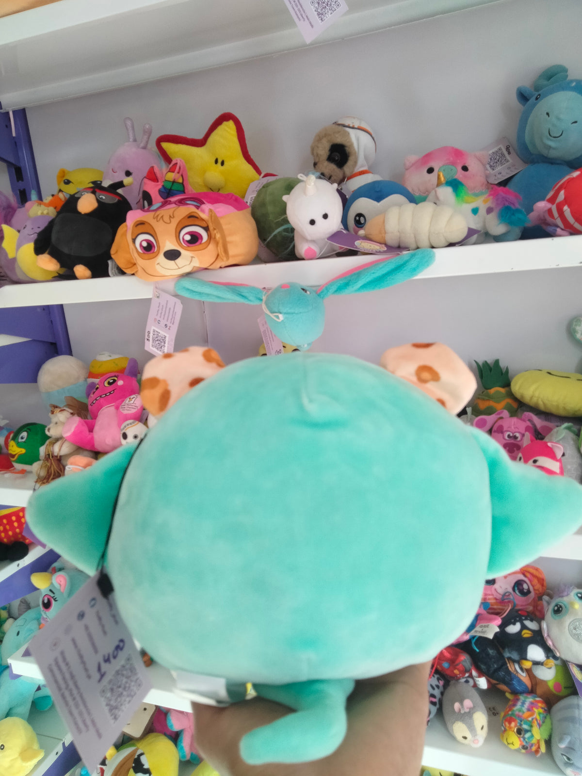 Squishmallows Lexie the Cheetah plush toy dressed in a stingray costume.