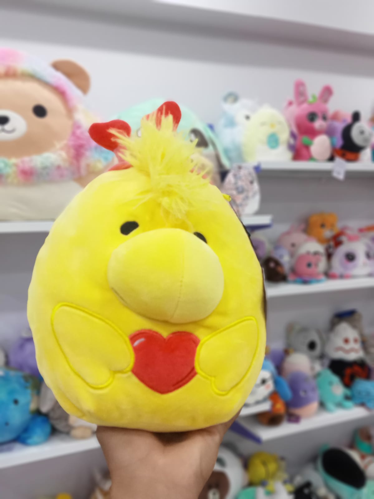 Woodstock from the Peanuts squad of Squishmallows plush toy.