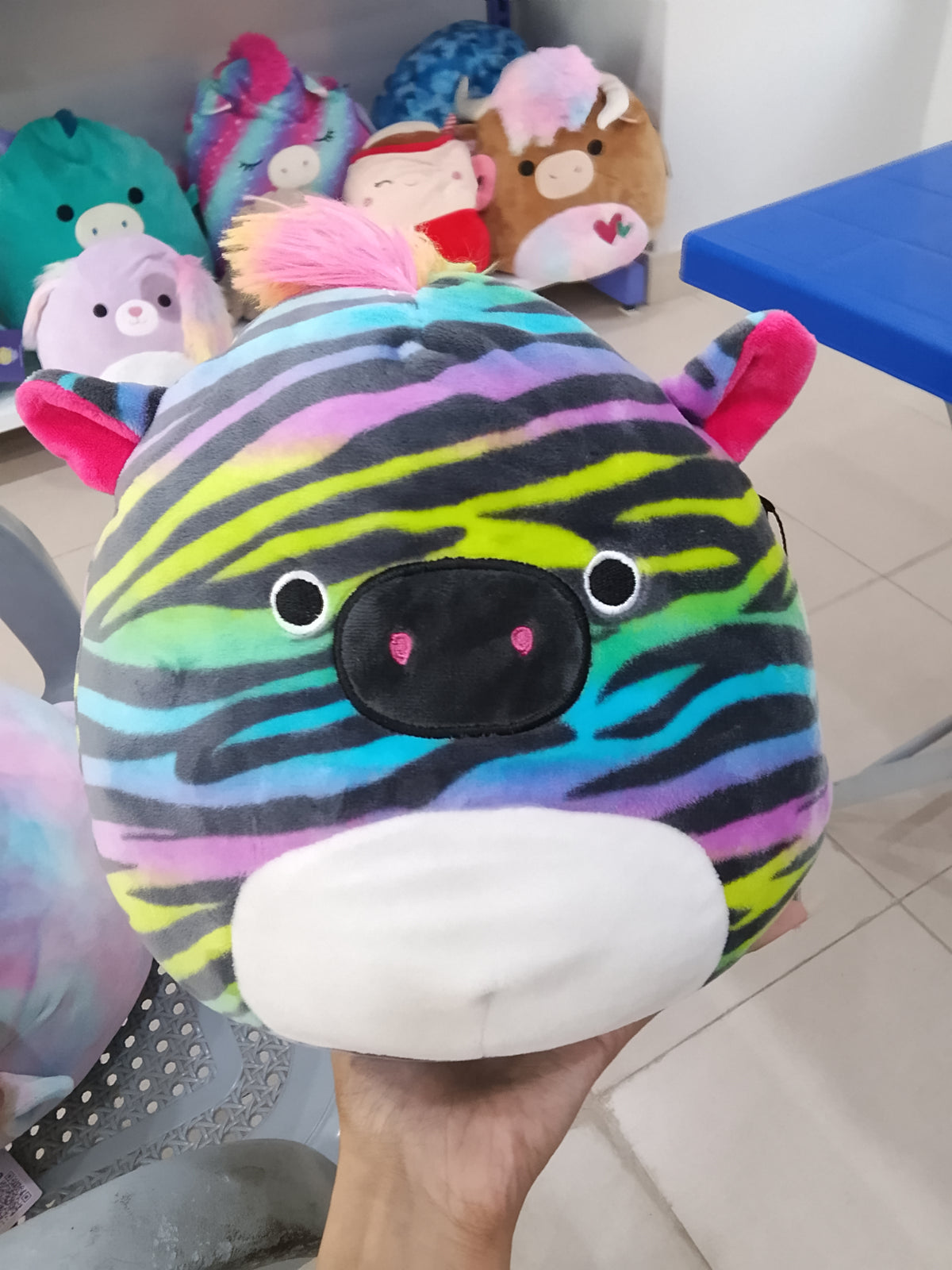 Squishmallows plush toy featuring the character Safiyah the Rainbow Zebra.
