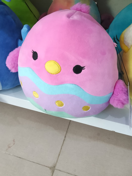 Squishmallows Empressa the Chick plush toy with a pink, blue, and yellow easter egg design.