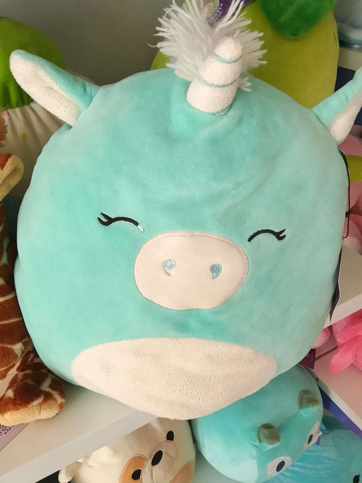 Squishmallows Kennedy the Unicorn Squish-Doos plush toy.