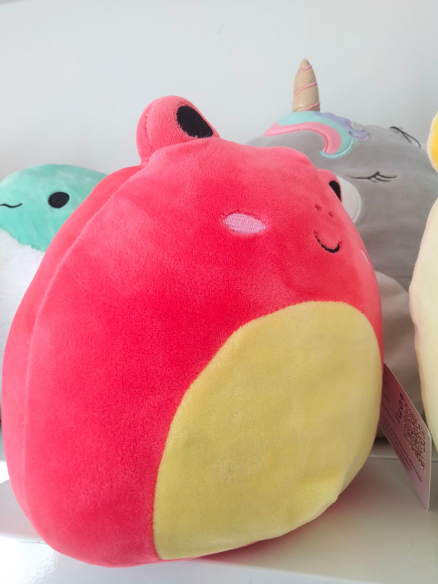 Squishmallows plush toy featuring the character Obu the Red Frog.