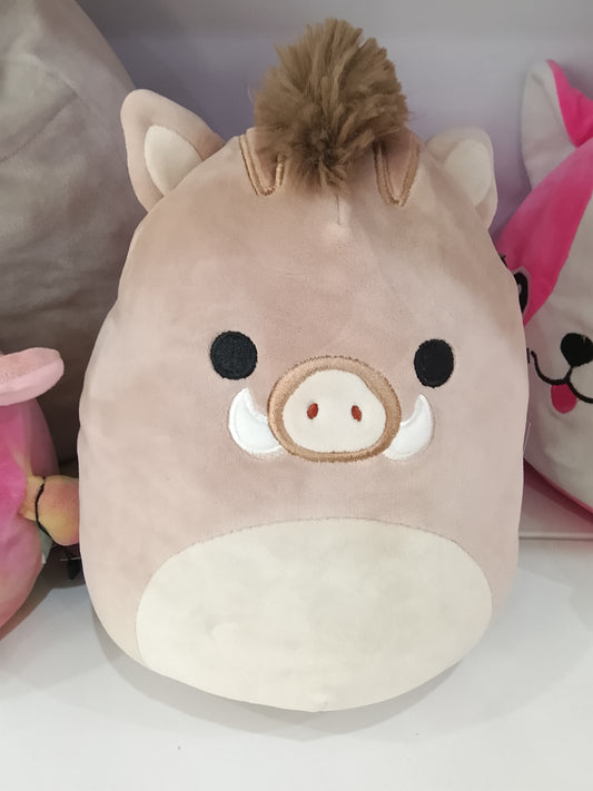 Squishmallows Warren the Boar plush in a light brown color with a beige belly and snout.