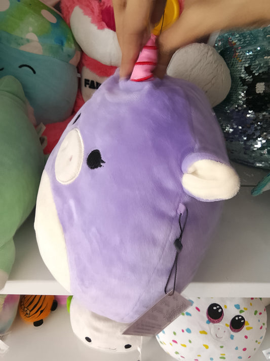 Squishmallows Astrid The Unicorn with Sleepy Eyes plush toy.