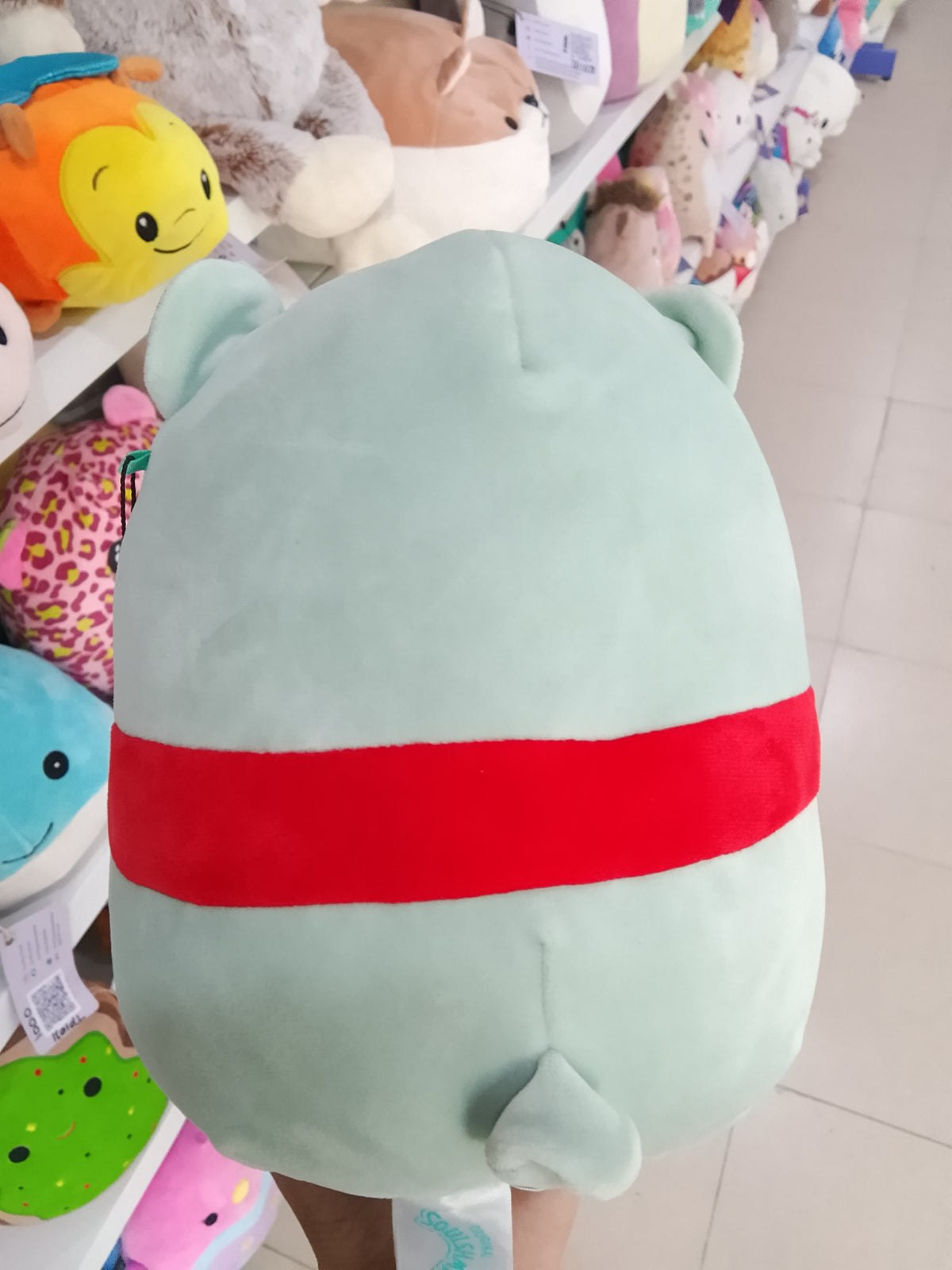 Squishmallows Bliss the Sparkle Bear plush toy .