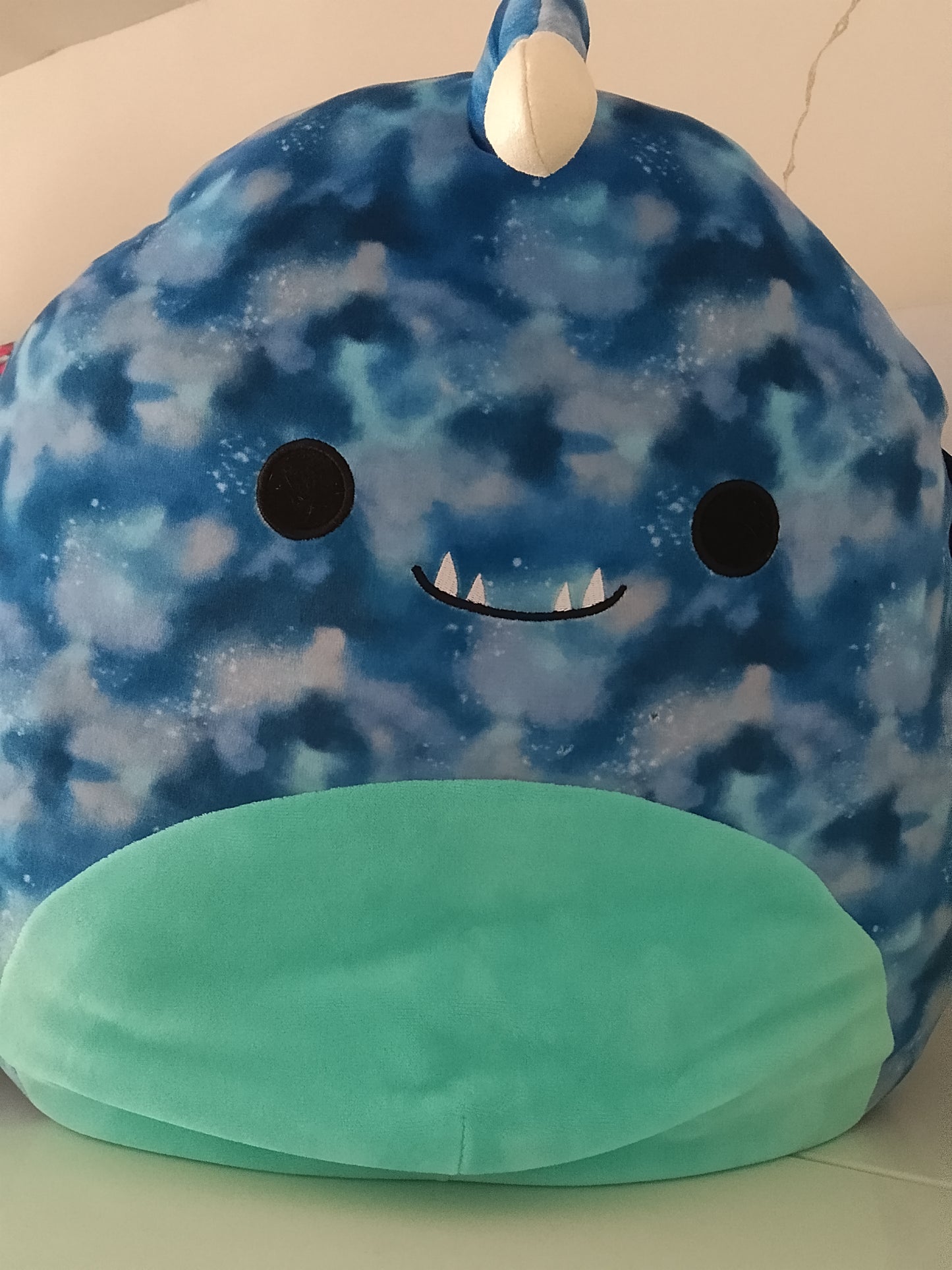 Squishmallows plush toy of Deezo the Anglerfish.