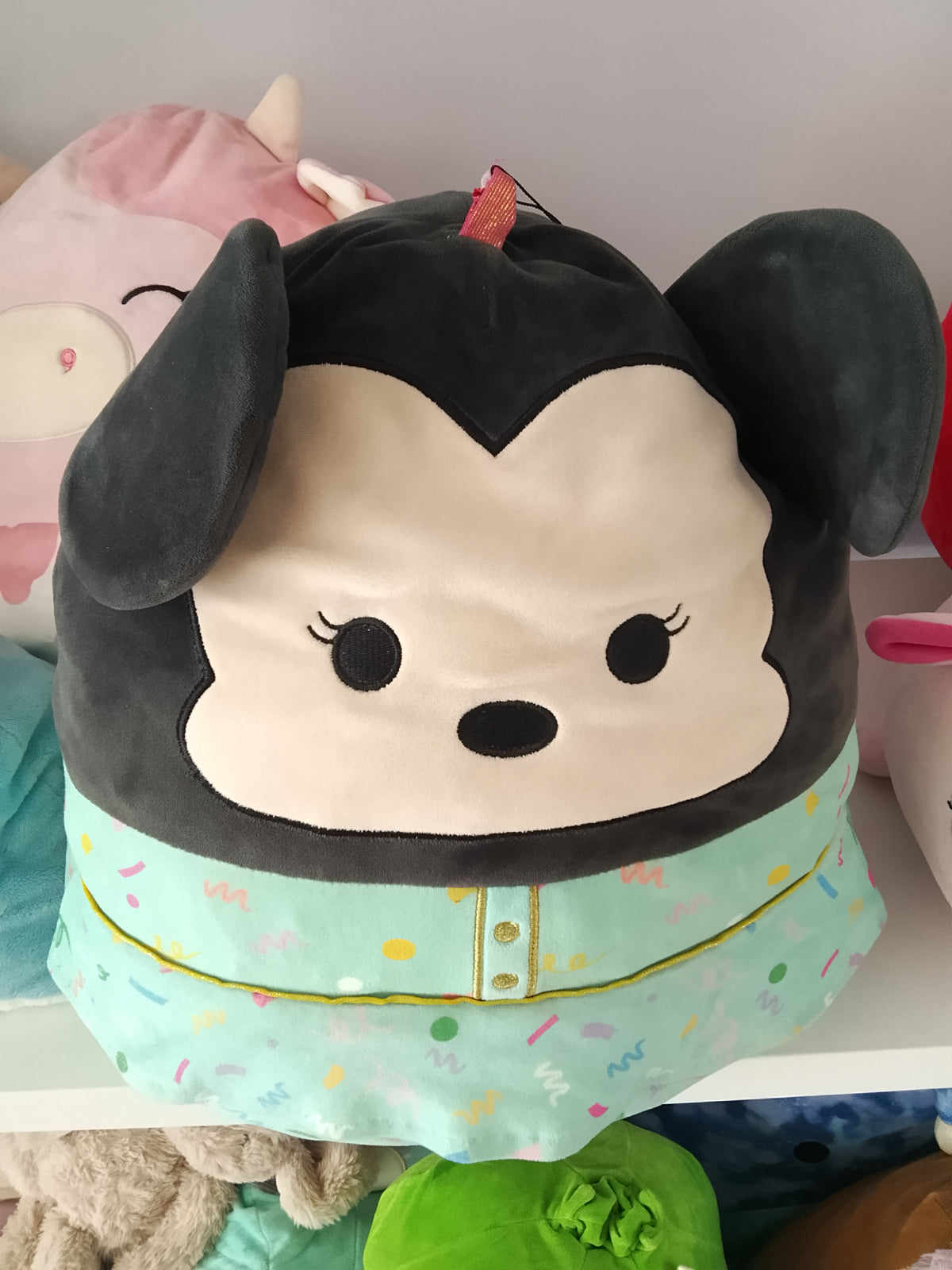 Squishmallows Disney Minnie Mouse plush toy.