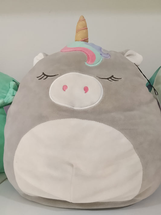 Squishmallows Teresa the Unicorn plush toy light grey body, a white belly, and a pastel-colored mane.
