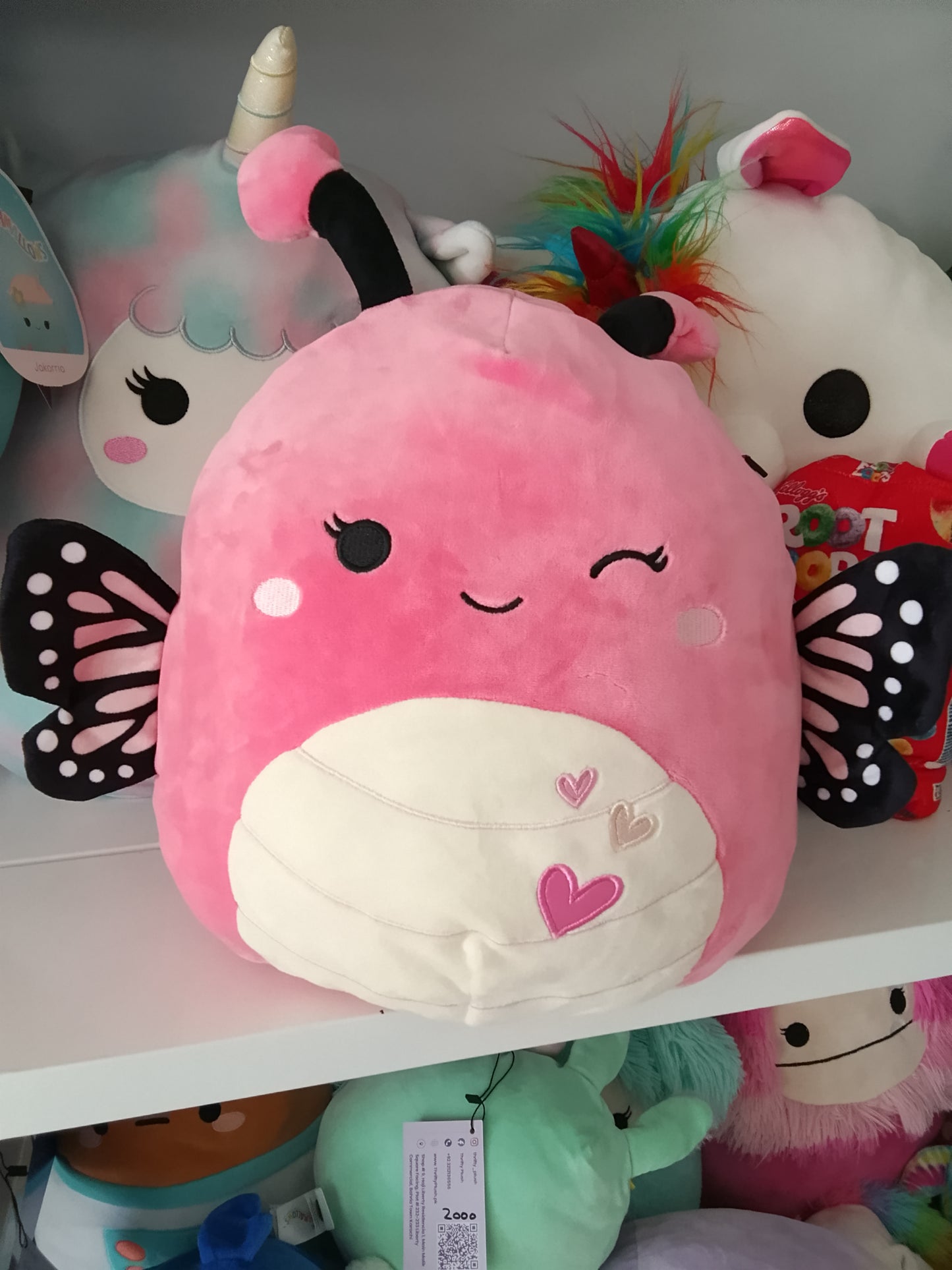 Squishmallows Andreina the Pink Monarch Butterfly plush toy.