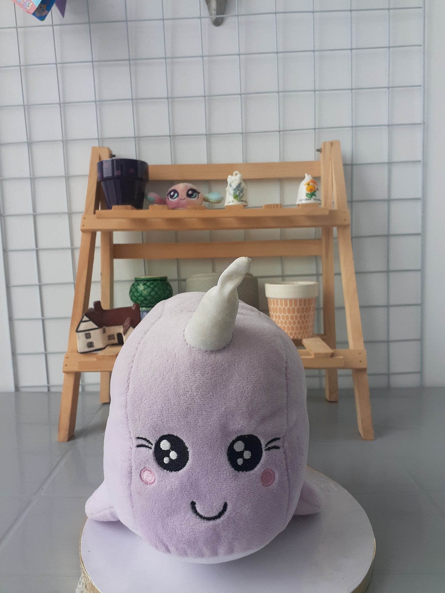 Naomi The Narwhal, A Purple Squishmallow Plush Toy.