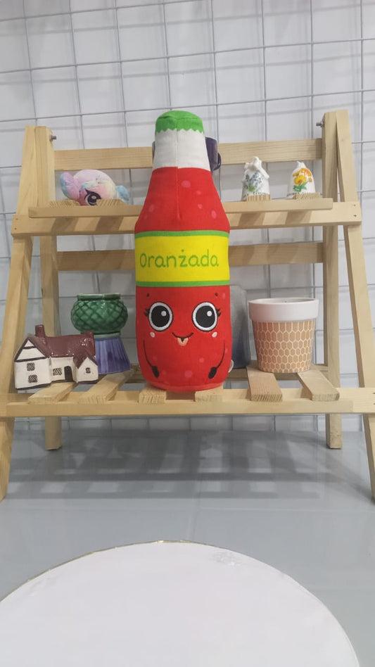 Plushie Resembling A Bottle Of Oranżada,