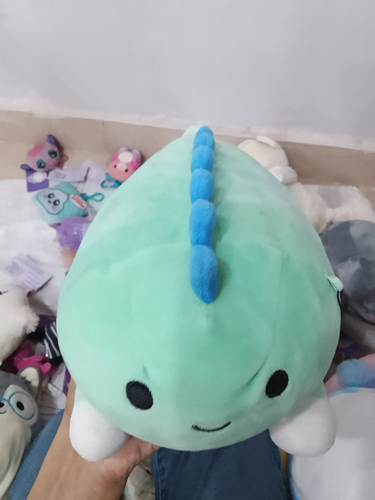 Squishmallows Rafa the Dinosaur Hug Mees plush toy in teal green.