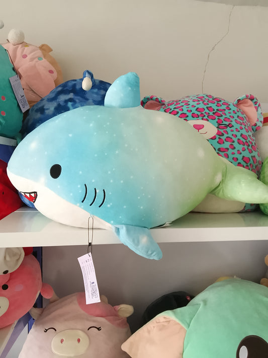 Squishmallows plush toy featuring the character Santos the Shark.