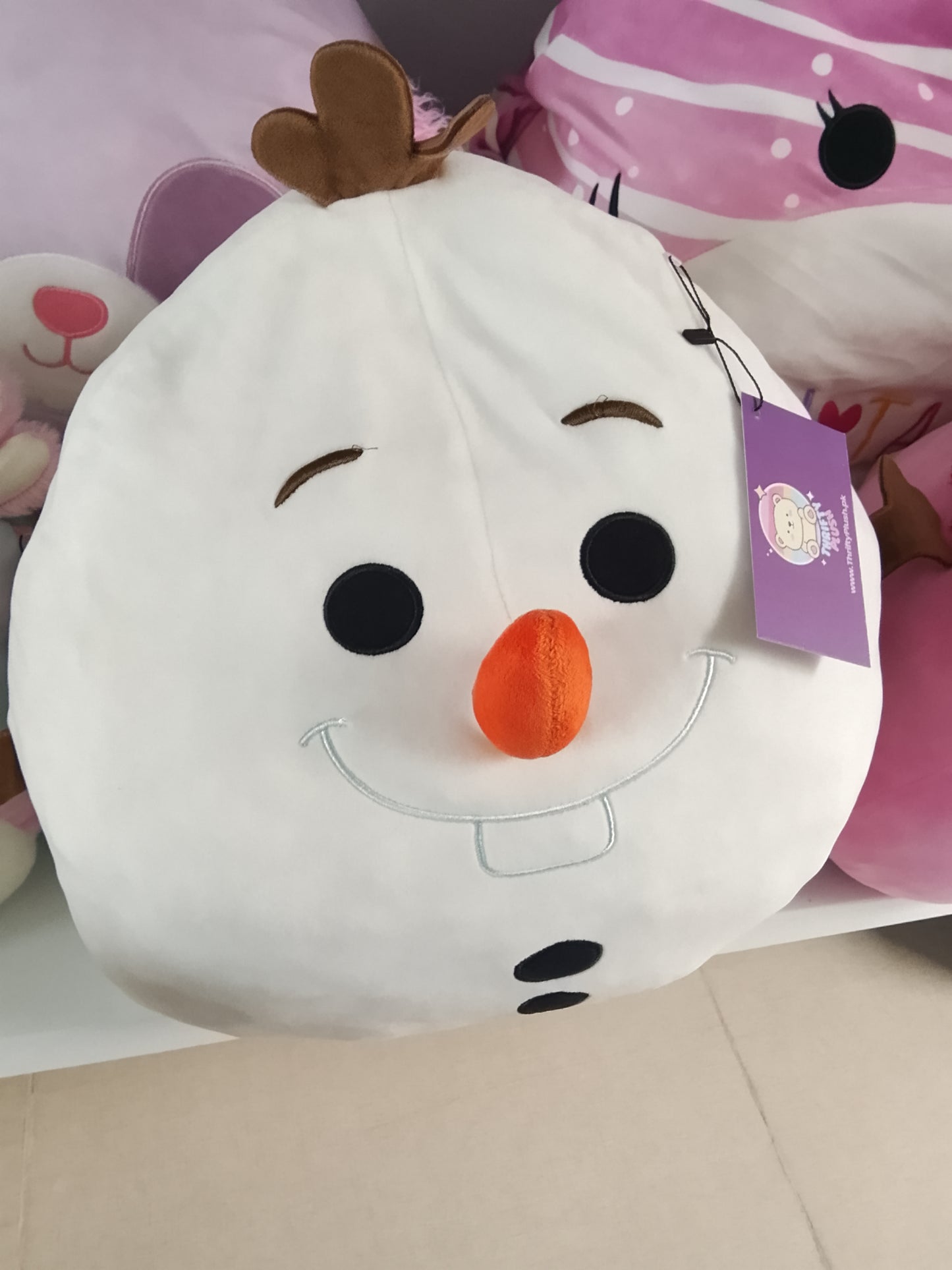 Disney Frozen Olaf Squishmallow plush toy.