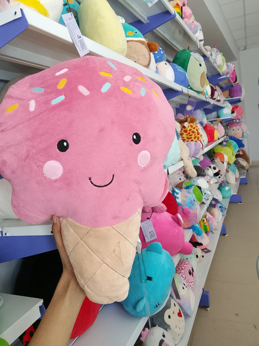 Squishmallows pink ice cream cone plush toy.