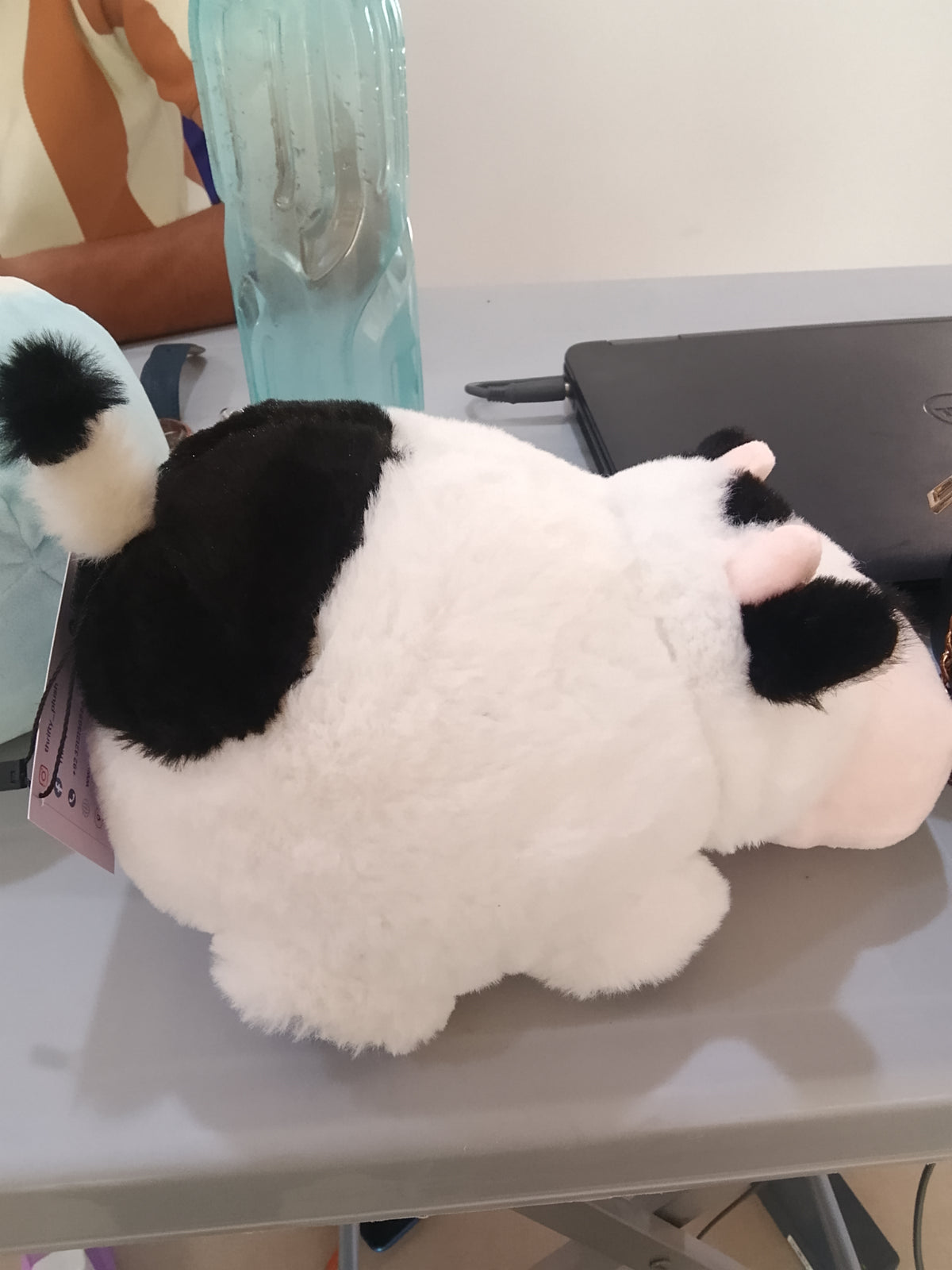 Aurora Spudsters Tutie Cow plush, designed with a rounded, potato-like shape.