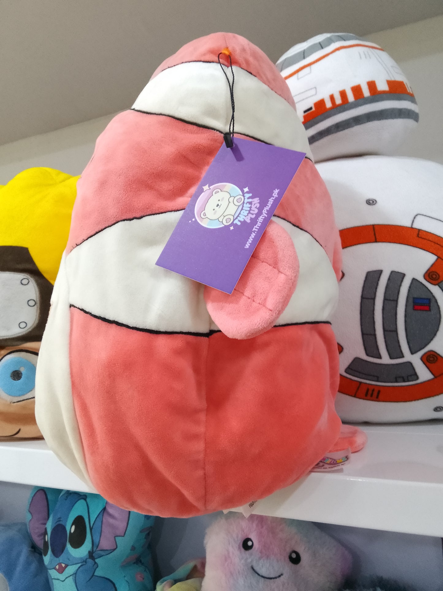 Squishmallows Ricky the Clownfish Plush toy.