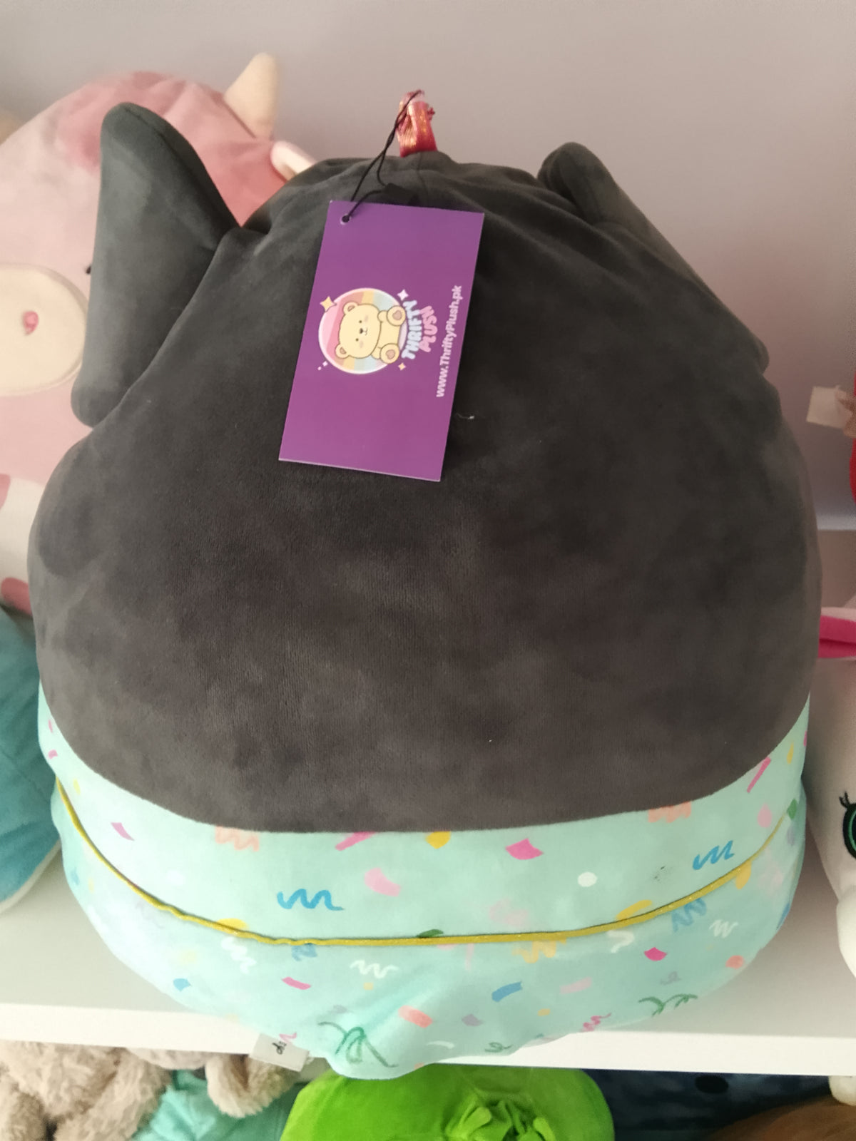 Squishmallows Disney Minnie Mouse plush toy.