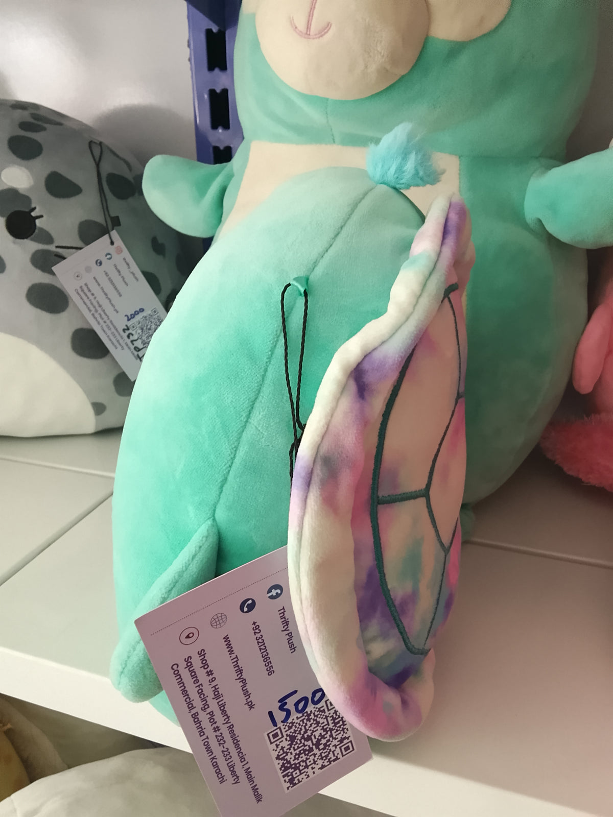 Squishmallows Cascade the teal turtle with a tie-dye shell Plush toy.