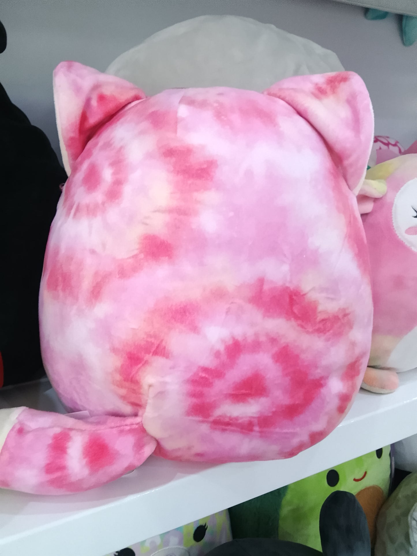 Squishmallow Kellytoy Sabine the Fox plush toy in a pink tie-dye pattern.