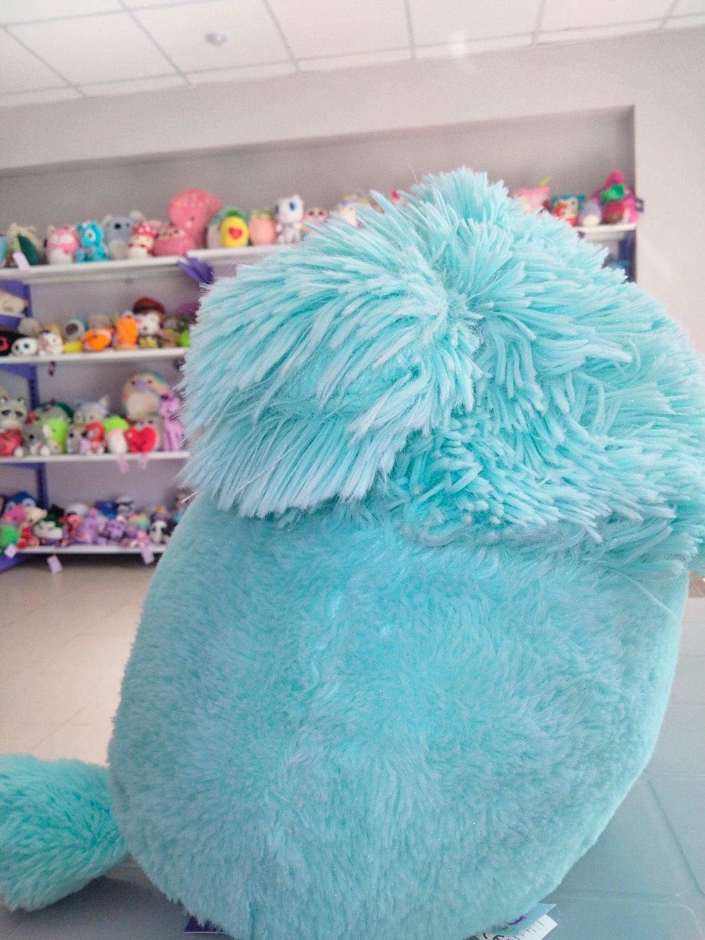Squishmallows plush toy, specifically Joelle the Bigfoot