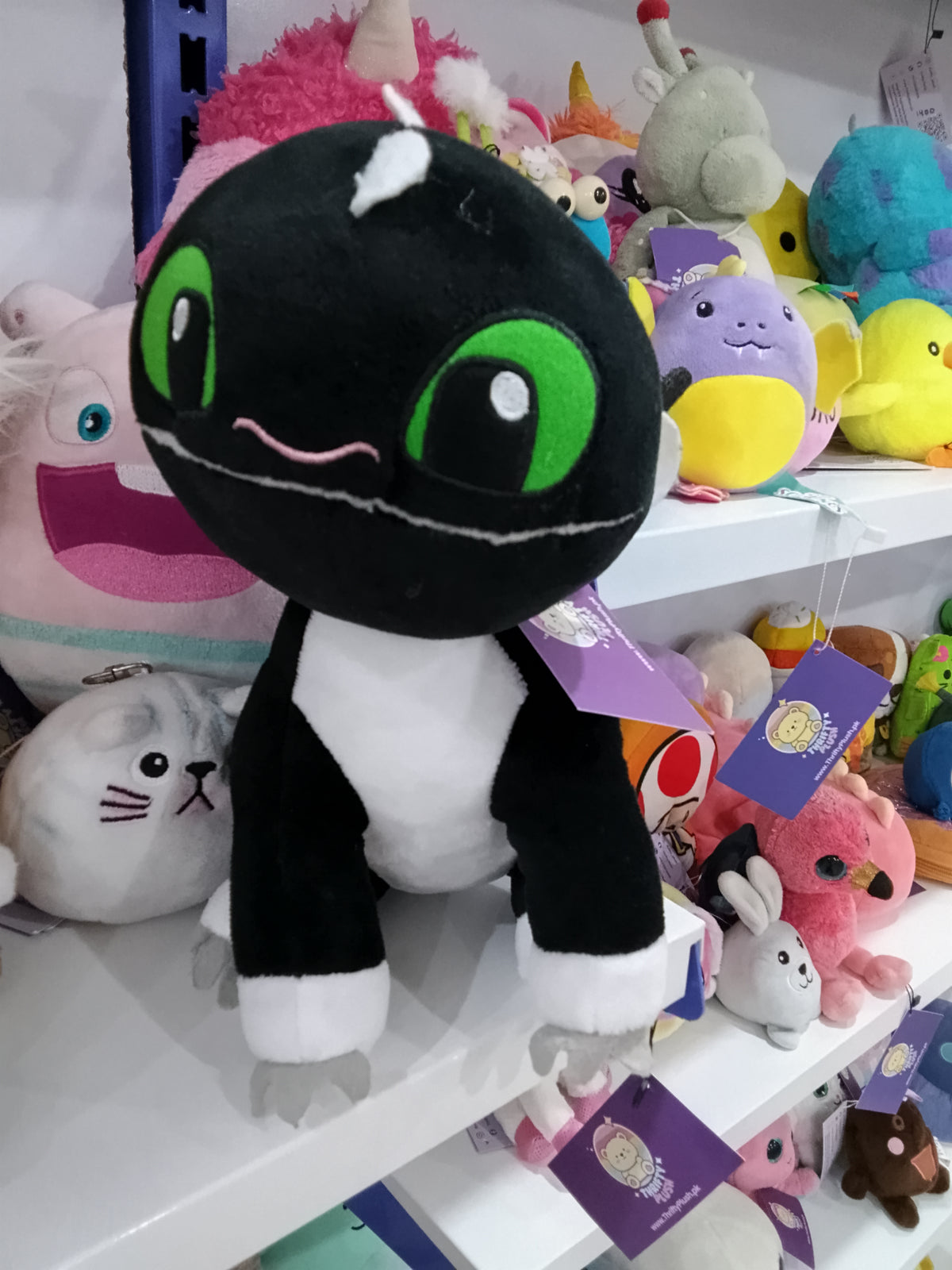 Toothless, the Night Fury dragon from the How to Train Your Dragon franchise plush toy.