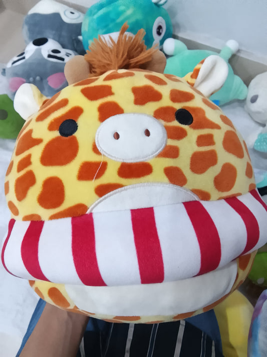 Kellytoy Squishmallows Gary the Giraffe plush red and white striped swimming inner tube.