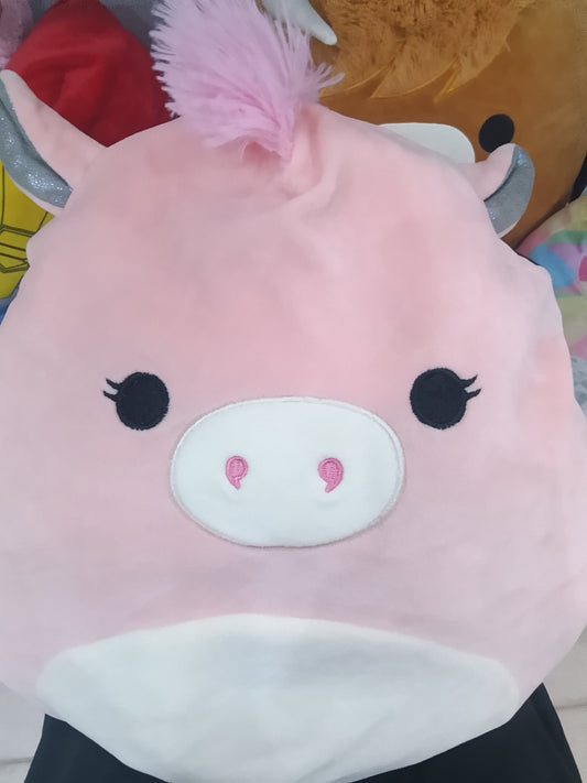 Squishmallow from the Dream Squad known for her pale pink color, shimmery silver wings, and flossy mane.