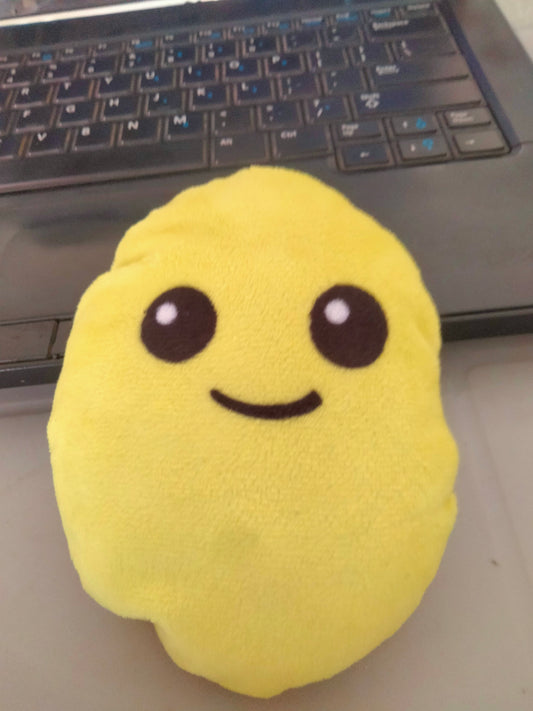 smiley emoji pillow with plush yellow fabric.