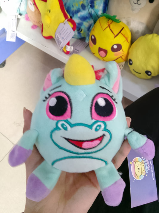 light blue Crunchimals Unicorn plush toy.