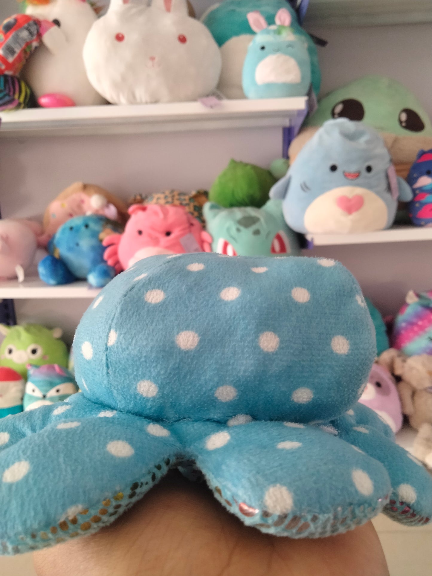 Reversible octopus plush toy,