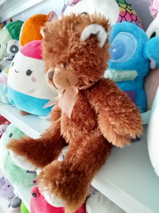 Brown Sugar teddy bear plush toy.