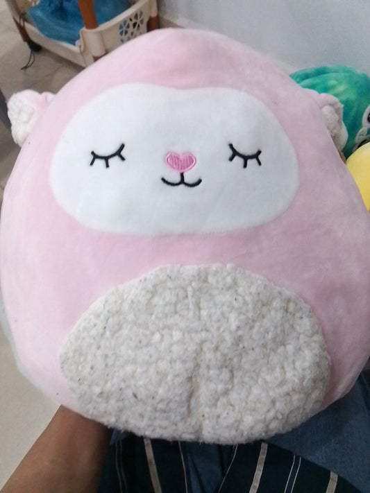 Squishmallows Elsa the Pink Lamb plush.