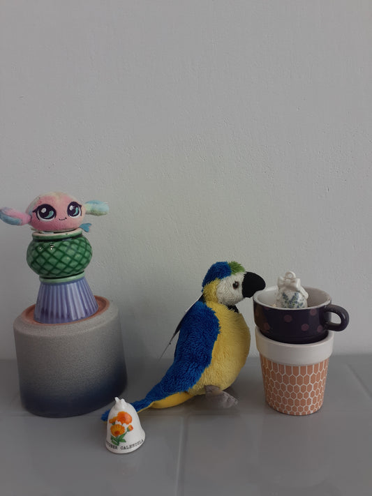 Plush Toy Of A Blue And Gold Macaw