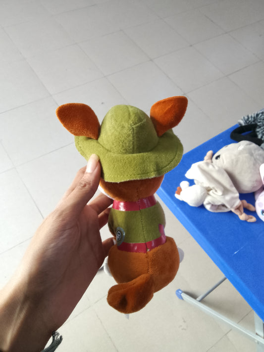 PAW Patrol Tracker plush toy featuring his signature green jungle hat and vest.