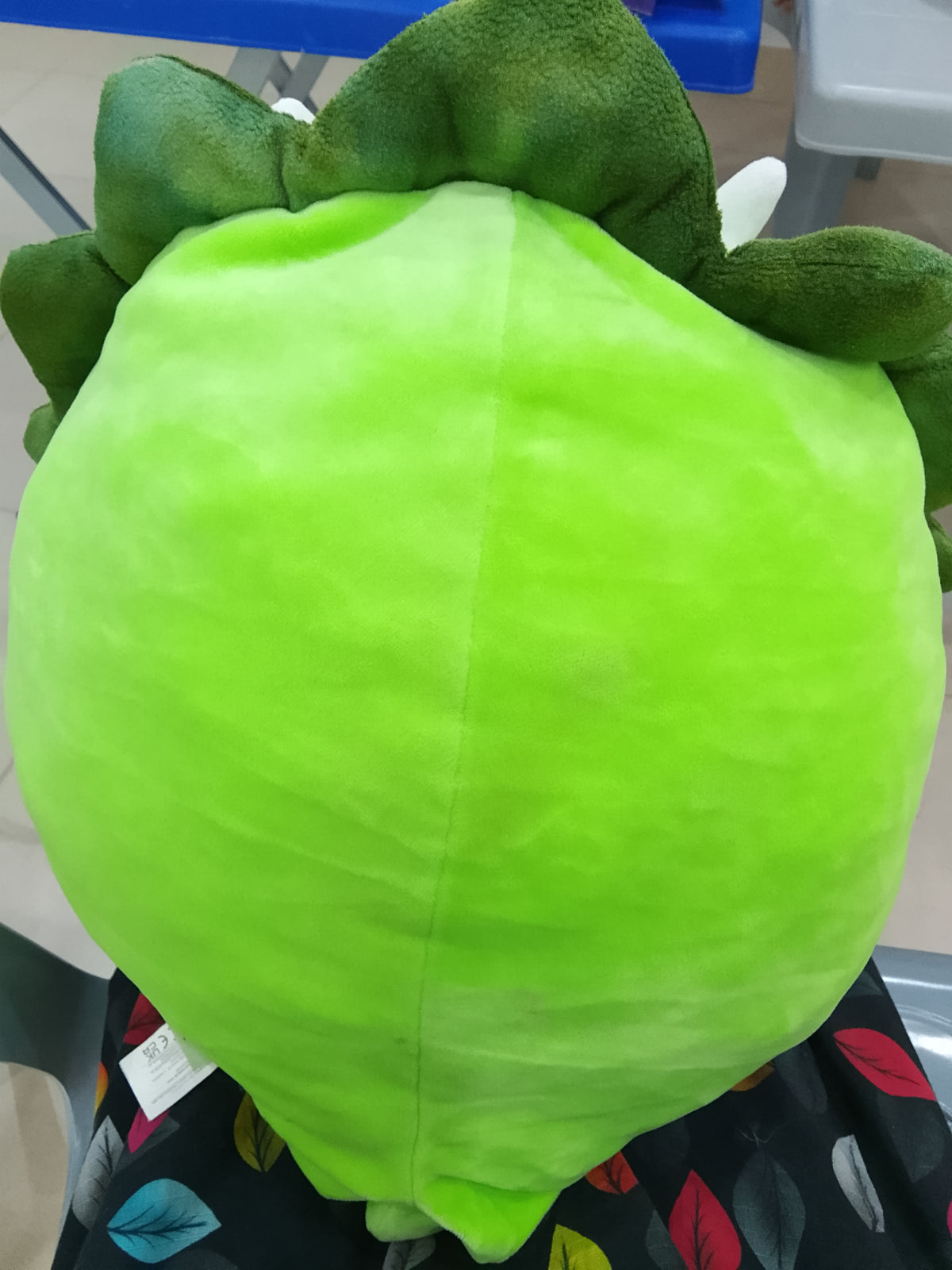 Squishmallows plush toy featuring Tristan the Green Triceratops dinosaur.
