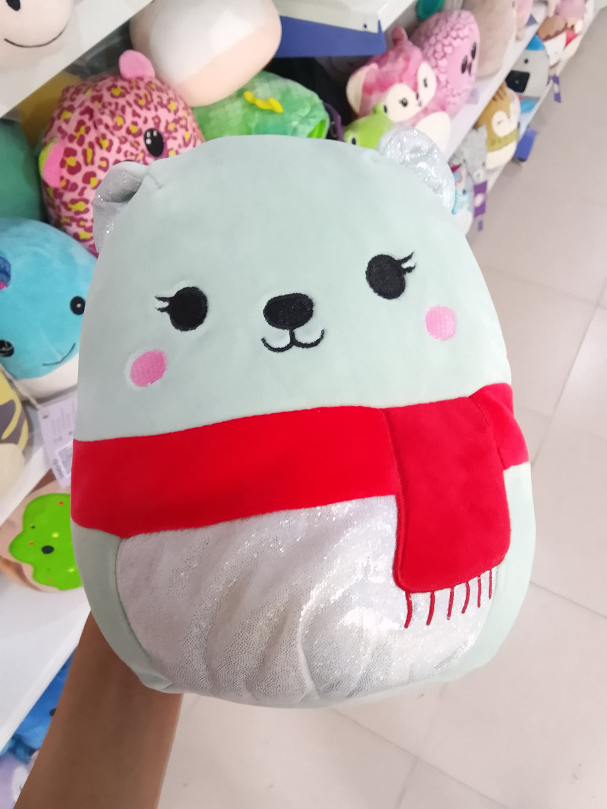 Squishmallows Bliss the Sparkle Bear plush toy .