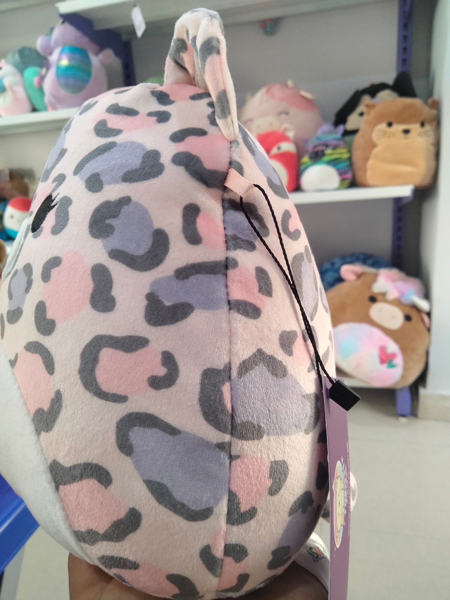 Squishmallows Dallas the Leopard plush toy.