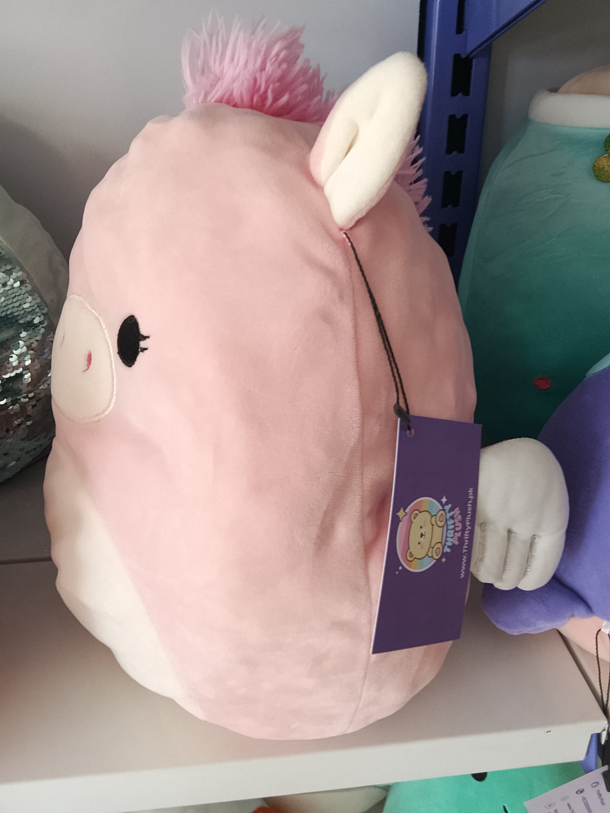 Squishmallows Pandora the Pegasus plush toy.