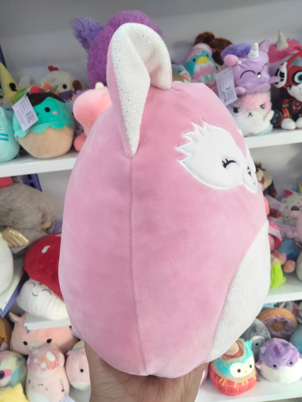 Flora the Fox 8-inch pink plush toy.