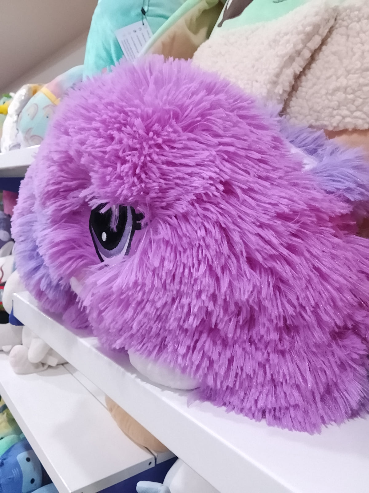 Cinnabun the Bunny purple plush toy.