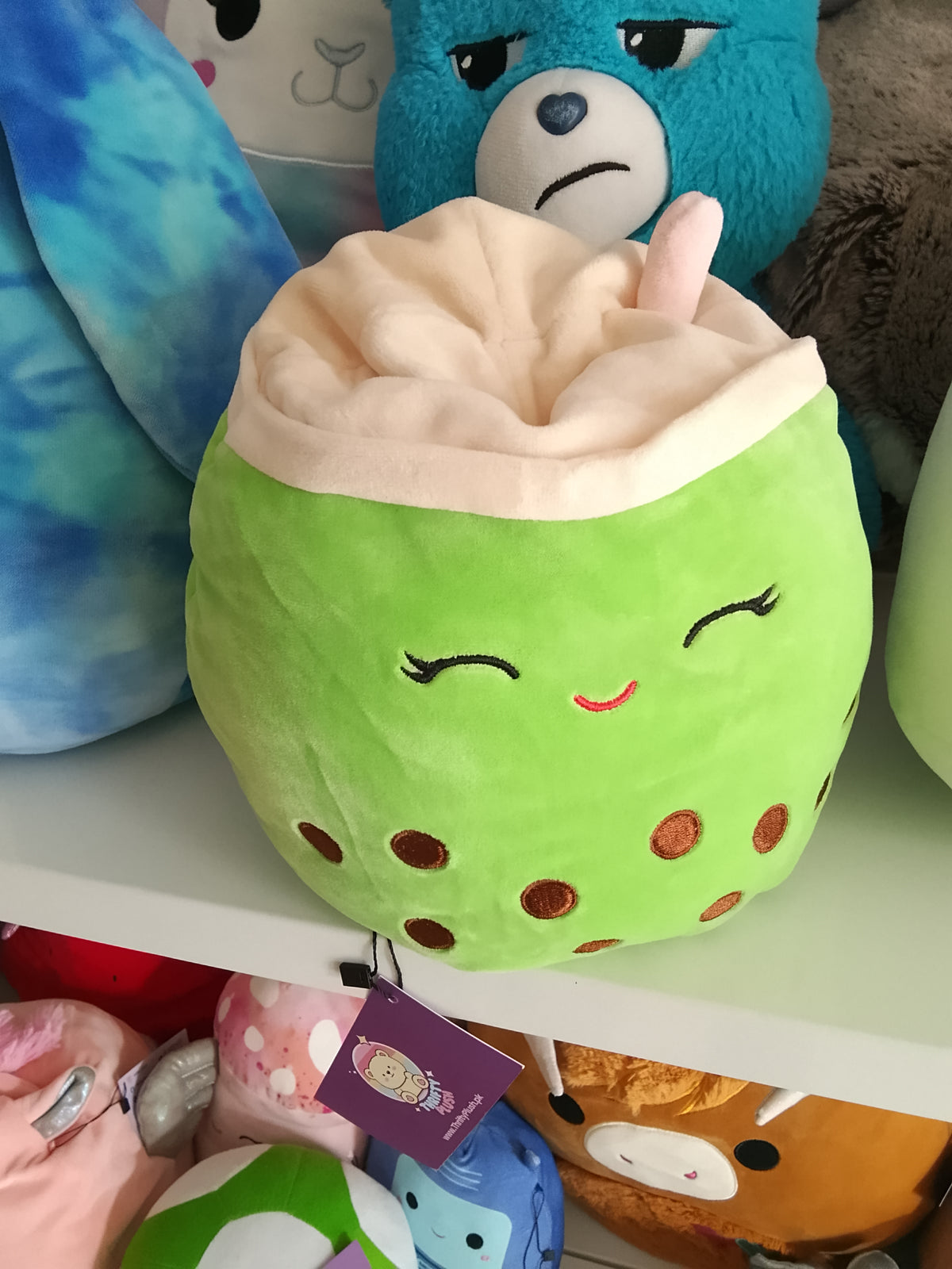 Kellytoy Squishmallows Flip-A-Mallow plush Kachina the Kiwi and Sevda the Boba Tea.
