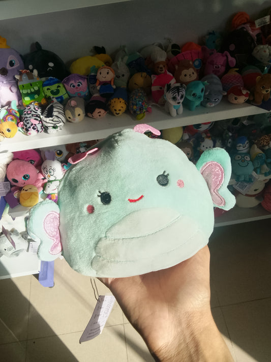 Squishmallow Kellytoy Flip-A-Mallow plush that reverses from a mint-colored butterfly to a pink axolotl