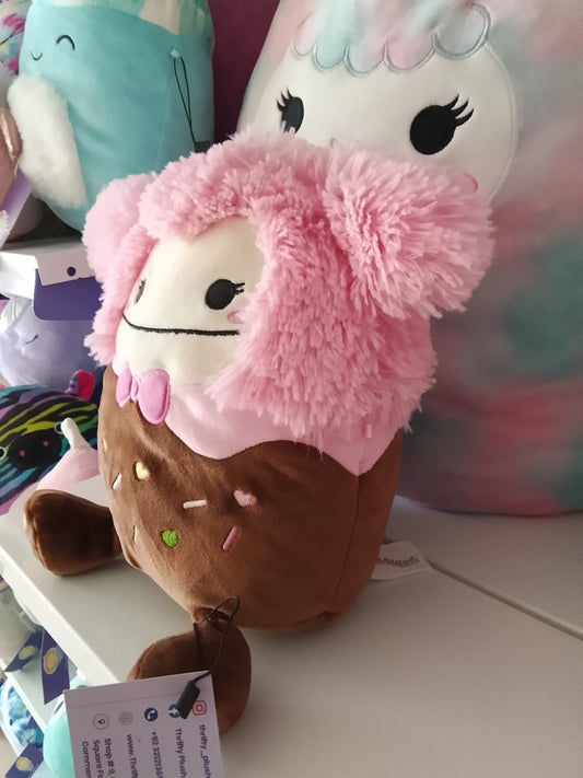 Squishmallows Brina the Chocolate Dipped Pink Bigfoot plush toy.