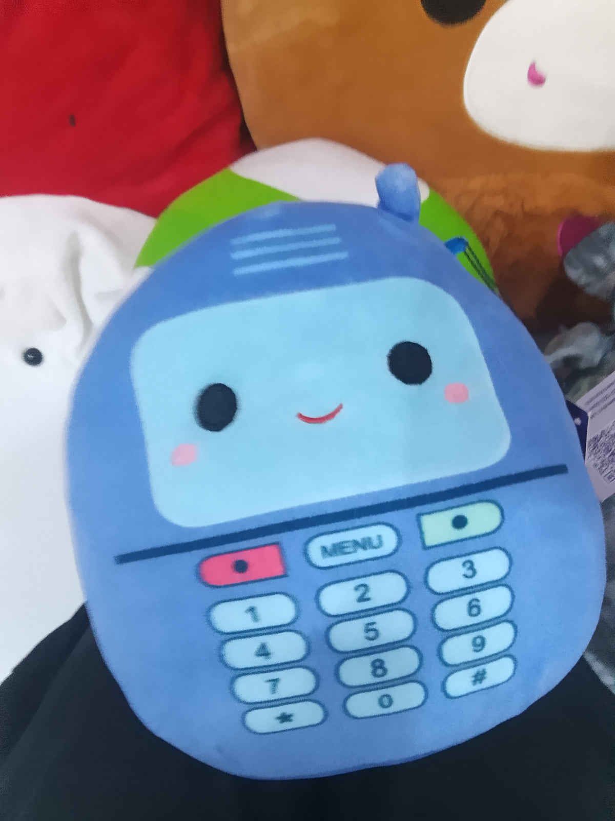 Kellytoy Squishmallows Tadita the Blue Cell Phone plush toy.