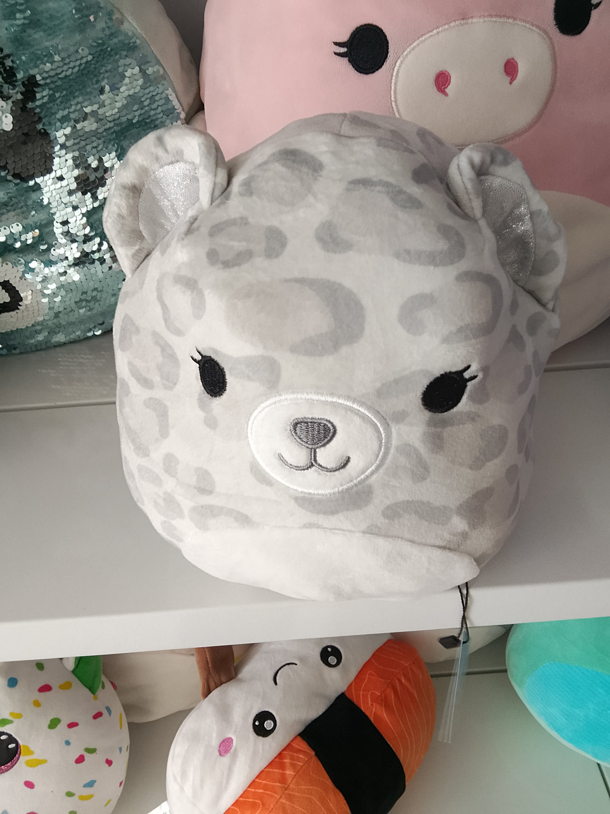 Squishmallows Flip-a-Mallow plush Dohna the Pink Panda and Mischa the Snow Leopard.