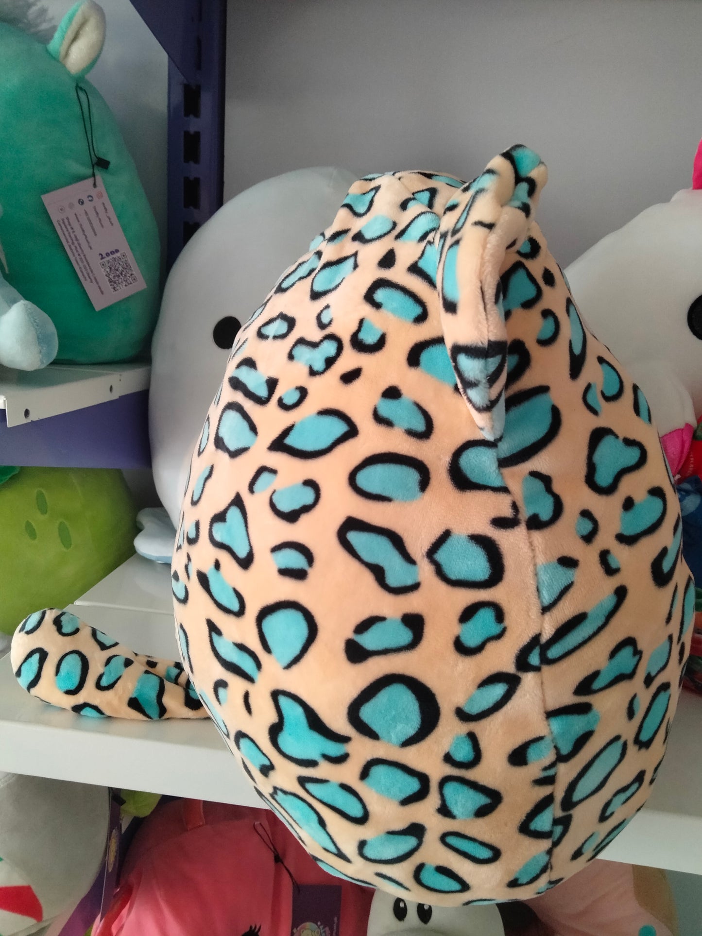 Squishmallows plush toy featuring the character Liv the Teal Leopard.