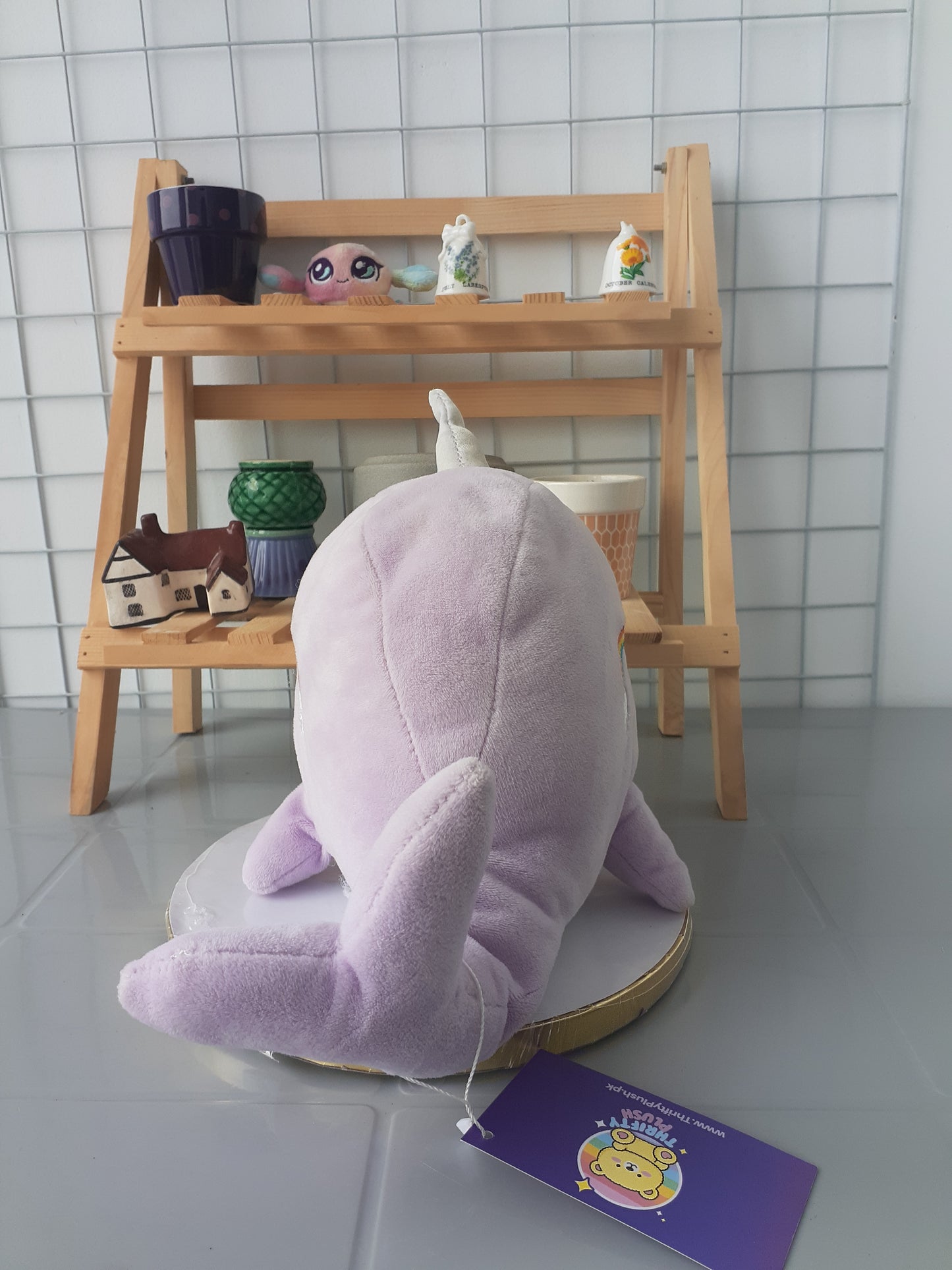 Naomi The Narwhal, A Purple Squishmallow Plush Toy.