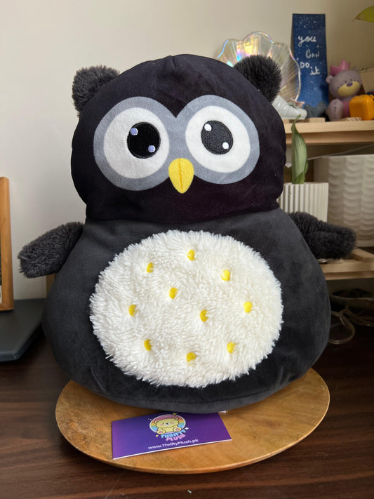 Squishees Black owl with a white, patterned belly.